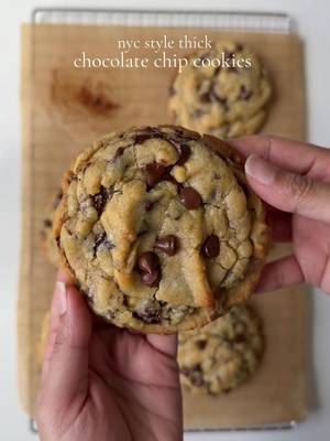 Ingredients  2 1/4 (285g) cups all purpose flour  1/4 tsp baking soda 1/2 tsp baking powder  1 tbsp corn starch  1 cup (200g) dark brown sugar  3 tbsp (37g) granulated sugar  1 egg + 1 egg yolk, cold 1 cup (225g) unsalted butter, cold  1 tbsp vanilla bean paste 1 cup (250g) semi sweet chocolate chips  1/2 cup (125g) milk chocolate chunks Pinch of salt 1/2 tsp espresso powder coffee  Method: In a bowl or stand mixer add cubed cold butter. Beat on high until creamy for about 2 min. Add in brown sugar and granulated sugar. Beat again for 2-3 min on high until well combined. Add in the egg and egg yolk along with the with vanilla bean paste. Mix on high for 3-4 min until everything is well incorporated. In a separate bowl add all purpose flour, baking powder, baking soda, salt, corn starch,instant coffee. Mix to combine. Gradually add dry ingredients to the wet mixture. Add in chocolate. Mix until just combined, do not over mix the batter at this stage. Scoop 6 ounces tall cookie dough balls on baking sheet.  Freeze the dough balls for at least 2 hours or overnight. Pre heat oven to 350 F. Place 3-4 cookies on a prepared baking sheet, leaving approximately 4 inches of space in between each cookie. Bake for 16-18 min or until the edges are golden and crispy and center is chewy and soft. Let cool completely before serving and enjoy. #cookies #Recipe #chocolatechip 