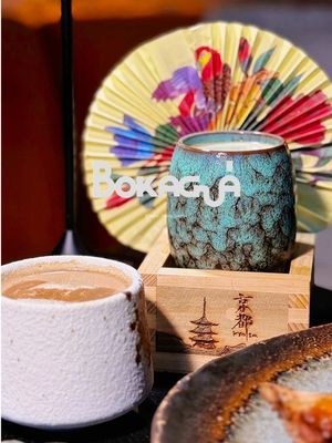 📍BOKAGUÁ 📍3541 Riverdale Ave Bronx, NY 10463 ✨ BOKAGUÁ, Dominican soul meets Asian elegance in the heart of Riverdale! This stunning fusion restaurant brings together the vibrant flavors of the Caribbean with the refined techniques of Asia, creating a culinary experience that's pure modern sophistication.  Step into a Caribbean dreamscape 🌴 where rain forest aromas dance through highend marble décor, Asian mystery fills every corner, and the crowd? Absolutely gorgeous, especially after dark! 💃🕺 The Salmon Salpicón🐟 is pure paradise – that passion fruit nuoc chấm brings bright, tangy notes that dance with buttery salmon and creamy avocado. The Spicy Tuna Tartare Montaditodelivers serious heat and tang 🔥 with tamarind's sweet-sour punch cutting through rich tuna. Caribbean Oxtail Samosas are comfort wrapped in crispy perfection – tender, fall-apart meat with yellow curry yogurt's creamy coolness and that watermelon hot sauce kick!  Lobster Fried Rice🦞 is pure luxury – every grain soaked in rich bisque, Thai basil adding aromatic freshness, with crispy boniato adding that perfect texture contrast.  The Jjajang Braised Shortribmelts like butter against velvety sweet plantain purée, while the Slow Cooked Crispy Octopus combines smoky sofrito chorizo richness. Sip on the Final Fantasy🥂 – St. Germain gin meets blackberry and champagne bubbles for berry-kissed elegance!  The Japanese Sunset brings sake's smooth sophistication with bright yuzu and green shiso freshness, while Champolao'delivers ginger liqueur's warming spice with elderflower's floral sweetness. End with Majarete Custard Tart🍮 – creamy corn custard meets popcorn ice cream and Japanese whiskey salted caramel for pure bliss!  #BOKAGUA #RiverdaleDining #NYCEats 