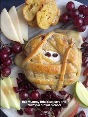 The spookiest charcuterie board you’ll ever see 🧀 Ingredients: 1 wheel Primo Taglio Brie Cheese 3 tbsp Signature Select Jam 1 sheet puff pastry, thawed 1 egg (for egg wash) 2 dried cranberries or blueberries (for eyes) Cooking: Bake at 400°F for 20–24 min until golden #Halloween #halloweenrecipes #fallcooking #charcuterie #cheeseboard