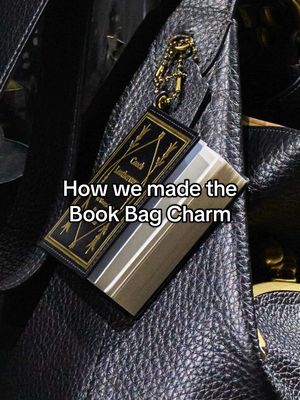 Can’t go anywhere without a Coach bag and a book (charm). 📖 The Book Charm, from our craftspersons hands to the #CoachSpring26 runway 🖤 #CoachNY #NYFW 📸: Isidore Montag