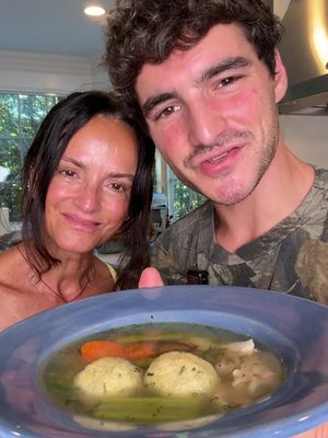 Dishes I Grew Up On: Matzah Ball Soup  Yes, this is traditionally a passover dish but is there ever a time when matzah ball soup isn't appropriate? The answer is no. It’s getting chillier out and this soup heals more than just a head cold. It’s comfort and nostalgia in a bowl. In our home, it's always been @Manischewitzco matzah meal for the matzah balls. A classic taste that's easily customizable and always satisfactory.  We like our matzah balls dense and chewy, so not too much water  and 10-15 minutes in the fridge before forming the balls. If you like your matzah balls soggy and falling apart, to each their own, but I am judging you. Make this next time your having a bad day or to make a good day even better. I love you ♥️ #manischewitz #matzahballsoup #familyrecipe #soup #jewishfood 