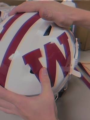 putting on the finishing touches #Badgers #CollegeFootball #throwback #helmet 
