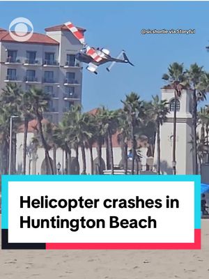 Five people were hospitalized when a helicopter crashed in the Southern California city of Huntington Beach on Saturday. City officials tell CBS News that the two people on the helicopter were safely pulled from the wreckage. Three pedestrians on the street were also injured in the incident, and all five people were taken to the hospital for treatment. #huntingtonbeach #california 
