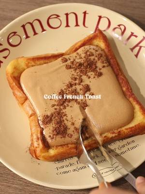 🍞☕️ Dalgona Coffee French Toast 📝 Recipe 2 Slices • Bread Sweetened Condensed Milk 1 Egg 30g • Milk Butter Cocoa Powder Coffee Cream: 20g • Whipping Cream 20g • Milk 2 tsp • Instant Coffee 10g • Icing Sugar Instructions: • Spread & Bread - spread condensed milk on bread and stack another bread on top • Soaking; Bread - prepare a bowl - crack open 1 egg, pour milk, and whisk - soak / dip the bread  • Cooking; Bread - melt butter on a pan in medium heat - cook the bread and flip the bread until both sides are cooked with brown color • Coffee Cream - pour whipping cream and milk - put instant coffee and icing sugar, then mix with hand mixer / milk frother until thickened • Finishing; French Toast with Coffee Cream - flatten french toast in the middle to make space for the coffee cream - pour the coffee cream on top - sprinkle a little of cocoa powder on top with a strainer — #frenchtoast #coffee #asmr #breadrecipe #homecafe