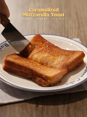 🧀🍞 Caramelized Mozzarella Toast 📝 Recipe 60g • Butter / Margarine 3 tbsp • Sugar Bread Slice 40g • Mozzarella Cheese Instructions: • Butter + Sugar - mix butter and sugar together • Bread - spread butter + sugar on a slice of bread - prepare another slice of bread and put mozzarella cheese on the bread - stack bread with the bread that already has butter and make it face the top • Cooking; Bread - heat pan in medium heat - fry the buttered bread on the pan in medium-low heat - spread another butter + sugar on the bread that is still plain - flip the bread to fry the other side of the bread until both of sides are golden brown • Finishing; Caramelized Mozzarella Toast - once the bread is cold, it’s gonna be crunchy because of the caramelized sugar then you can enjoy! — #toast #caramelized #asmr #EasyRecipe #homecafe 
