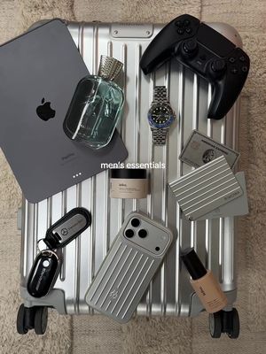 Some daily men’s essentials 🙏🏿 #travelessentials #mensessential #rimowa #iphone17pro #mercedesbenz 