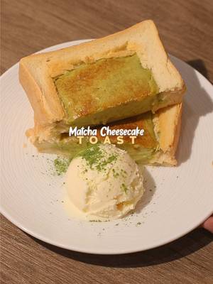 🍵🧀🍞 Matcha Cheesecake Toast 📝 Recipe 1 Slice • Thick Sliced of Bread 150g • Cream Cheese (room temperature) 40g • Sugar Vanilla Extract 1 Egg 75g • Whipping Cream 4g • Cornstarch 4g • Ceremonial Matcha Powder 1 Scoop • Vanilla Ice Cream 👩‍🍳 equipments needed: aluminium foil, airfryer/oven *note: you can use this recipe with 2 slices of thick bread! Instructions: • Bread - make a space in the middle of the bread by cutting it square in middle like in the video - then flatten the middle with spoon  - wrap the bread with aluminium foil and cut open the space in the middle  • Matcha Cheesecake Batter - put cream cheese on a bowl, sugar, and vanilla extract then mix everything with spatula - crack open one egg then mix - pour whipping cream then mix  - put cornstarch and matcha powder then mix again • Bread + Matcha Cheesecake Batter - pour matcha cheesecake batter on the bread • Baking; Matcha Cheesecake Bread - bake the matcha cheesecake bread in the air-fryer at 150°C for 30 minutes / in the oven at 180°C for 30-40 minutes  • Finishing; Matcha Cheesecake Toast - serve the matcha cheesecake toast with vanilla ice cream and enjoy! — #homecafe #matcha #asmr #toast #cheesecake