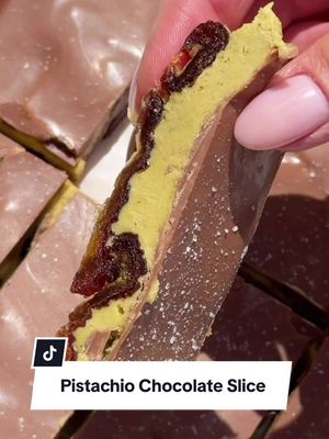 Pistachio Chocolate Slice 🍫✨ All my period cravings layered into one dangerously delicious bite… I figured it was time to stop eating the pistachio spread straight from the jar and be civilised - by making an entire tray of these instead 🙃😆 What you’ll need: * 9 large Medjool dates (pitted) * 2 heaping tablespoons @fixand pistachio spread * 100g melted chocolate How to make it: 1. Gently open each date and spoon over a generous dollop of pistachio spread. 2. Drizzle with melted chocolate until fully coated (or partially - you do you). 3. Pop them in the fridge to set. That’s it. Gooey, nutty, chocolatey perfection. Sweet, salty, satisfying and technically still a snack. Tag someone who needs to try this 💚  #EasyRecipe #pistachio #snack #easysnack #yummyfood 