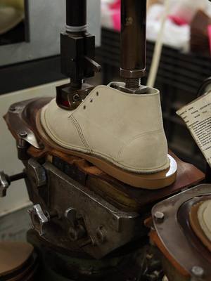 Taking boots from rough cut ➝ Red Wing quality. #RedWingShoes #PressTrim