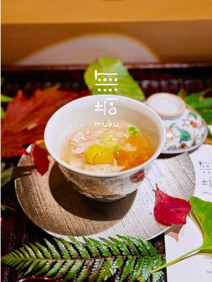 Pure culinary poetry in Tribeca 🇯🇵✨ 📍Muku 📍412 Greenwich St Penthouse B, New York, NY 10013 Just experienced Muku and I'm still speechless! This isn't just dinner - it's a 10-12 course JOURNEY through Japanese purity 🍃 Chef Manabu Asanuma: A Master's Touch 👨‍🍳 This man worked at NYC's most acclaimed Japanese restaurants. Silver Egg award winner in Japan's prestigious RED U-35 competition. The credentials speak for themselves! 🏆 The Kaiseki-Inspired Experience 🌸 Muku (無垢) means "purity" - and every single course embodies this philosophy. Chef celebrates **goho** - the five classical Japanese techniques: raw, grilled, simmered, steamed, and fried. Nothing superfluous, just perfection on a plate 💯 The Menu Highlights: **MUSHIMONO** - Hairy crab chawanmushi with persimmon & foie gras 🦀 SO delicate and luxurious! **OTSUKURI** - Seasonal sashimi that was pristine perfection 🐟 **YAKIMONO** - Black seaperch with fig, sesame & burdock root - the char was *chef's kiss* 🔥 **AGEMONO** - Anago tempura with ponzu & yuzu-kosho - crispy heaven!  **NABE** - Mizutaki chicken hot pot that warmed my soul 🍲 **GOHAN** - Matsutake rice topped with A5 WAGYU SIRLOIN sukiyaki! I died and went to heaven 🥩✨ But the MOST special moment? **House-made SOBA** with buckwheat from Chef's hometown - grown by his own parents! The seasonal mushroom dashi was perfection 🍜💚 **MIZUGASHI** - Japanese chestnut mont blanc with whisky maple ice cream closed everything beautifully 🌰 Every dish tells a story. Seasonality, simplicity, intention - this is Japanese cuisine at its purest form.  #MukuNYC #JapaneseCuisine #Kaiseki #TribecaEats #NYCFoodie          