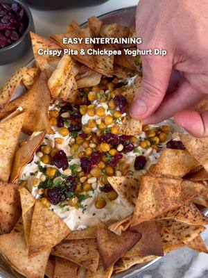 Crispy pita and chickpea yoghurt dip using @YoPRO AU plain yoghurt. Ingredients For the pita chips: 3 loaves pita bread, cut into triangles 2 tablespoons olive oil ½ teaspoon smoked paprika For the yoghurt sauce: 2 cups YoPRO plain yoghurt 2 garlic cloves, minced Juice of ½ lemon (about 1 tablespoon) 3 tablespoons tahini 1 tablespoon chopped fresh mint 1 teaspoon lemon zest 1tbsp olive oil Salt and pepper, to taste For the chickpeas: 2 can (400g) chickpeas, drained and rinsed 1 teaspoon cumin powder 1/2 teaspoon salt To garnish: 1 big handful (about ¼ cup) fresh parsley, chopped ¼ cup toasted pine nuts ¼ cup dried cranberries Instructions Preheat your oven to 180°C (350°F). Cut pita loaves into triangles. Toss pita pieces with olive oil and smoked paprika until evenly coated. Spread out on a baking tray in a single layer. Bake for about 10 minutes, turning halfway through, or until golden and crispy. In a bowl, mix the yoghurt, garlic, tahini, lemon juice, mint, lemon zest, salt, and pepper. Taste and adjust seasoning if needed. Toss the drained chickpeas with cumin and salt. Spread on a baking tray and roast in the oven at 200°C (400°F) for 20 minutes, shaking or stirring halfway through. In a dry pan over medium heat, toast the pine nuts or almond slivers for 3–5 minutes, stirring frequently, until golden and fragrant. Watch closely to avoid burning. Spread the yoghurt sauce on a serving plate or bowl. Top with the chickpeas, crispy pita chips, parsley, toasted nuts, and sprinkle with dried cranberries. #AD #YoPRO #YoghurtDip #PitaChips #YoghurtRecipe