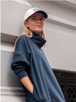 Meet the Bedford Mockneck — where cute meets comfortable. Styled by @simkinstyle_ #rhoback #craveactivity 
