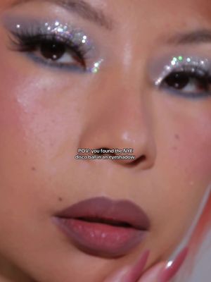 Imagine wearing this on NYE? Green blue silver oranges glitters in one @Trixie Cosmetics x @Brittany palette- tinsel town 🤌🏻  #glittermakeup #sparklymakeup 