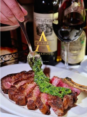 📍Club A Steakhouse 📍240 E 58th St New York, NY 10022 Stepping into Club A Steakhouse feels like walking through time itself. Tucked inside a 120-year-old brownstone on East 58th Street, this Midtown gem tells the story of Bruno—a man who arrived in America in the 1970s with nothing but dreams and determination 🇺🇸❤️ THE BRUNO LEGACY👨‍🍳 Bruno built an empire on hospitality and heart. Club A, named for his three sons—Arben, Agron, and Alban—is his love letter to family and excellence. WHAT WE DEVOURED🍽️ Started with their legendary **THICK CUT BACON**—applewood smoked perfection with Club A steak sauce 🥓 The **BAKED CLAMS** were a garlicky dream, while the **Chicken Parmesan** delivered pure comfort. But the star? That glorious **20oz BONE-IN RIB EYE** 😍 USDA Prime, dry-aged to perfection, with a char that dreams are made of. Paired with a loaded **BAKED POTATO** and crispy **ONION RINGS**, it was steakhouse heaven. The **CLUB A CHEESEBURGER** surprised us—juicy, perfectly caramelized onions, American cheese melting just right 🍔 THE VIBE✨ Old-world warmth meets modern sophistication. You can feel Bruno’s presence in every detail—the impeccable service, the attention to craft, the genuine hospitality that makes you feel like family. VERDICT⭐⭐⭐⭐⭐ This isn’t just dinner—it’s an experience steeped in tradition, passion, and the American dream. When you want the best steak in NYC with a side of soul, Club A delivers every single time. 📍 240 E 58th St, Midtown Manhattan 💰 Upscale but worth every penny 🎯 Perfect for: Celebrations, date nights, power dinners #ClubASteakhouse #NYCEats #SteakhouseLegacy #MidtownManhattan #BestSteakNYC  