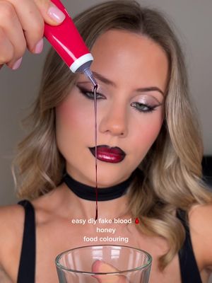 easy diy fake blood 🩸 soo quick and easy for a last minute halloween look!! and edible too 🤭 #halloween #halloweenmakeup 