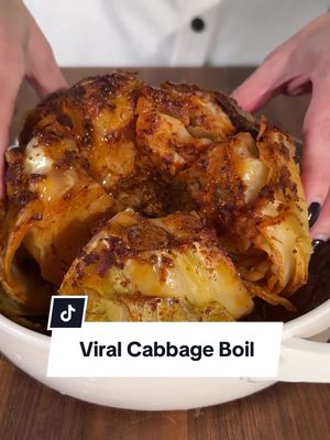 Say buh bye to seafood and say HELLO to Cabbage Boil! 🥬👋 When we saw @bigpapahannah, @serinaamadee.eats, and @cookiterica make this, we had to try it! Get the full recipe down below or at the link in the @allrecipes bio.  Ingredients: 1 head cabbage 1/2 tablespoon olive oil 2 teaspoons garlic powder, divided 2 teaspoons smoked paprika, divided 2 teaspoons paprika, divided 2 teaspoons Cajun seasoning, divided 2 teaspoons Old Bay® seasoning, divided 1 teaspoon chicken bouillon 1 lemon, juiced, divided 6 tablespoons butter, divided salt and freshly ground black pepper to taste Directions: Preheat the oven to 385 degrees F (196 degrees C). Remove core from cabbage and make 6  2-inch cuts down from the core about 1/4 of the way down. Coat the cabbage with oil. Season cabbage with a 1 teaspoon each of the following seasonings: garlic powder, smoked paprika, paprika, Cajun seasoning, Old Bay, and chicken bouillon. Squeeze 1/2 lemon over cabbage and rub spices into cabbage until completely coated.  Place 3 tablespoons butter in the center of cabbage and wrap tightly using two sheets of foil. Place on a baking sheet. Bake in the preheated oven for 1 hour. Meanwhile, melt remaining butter and whisk in remaining 1 teaspoon each garlic powder, smoked paprika, paprika, Cajun seasoning, Old Bay, and lemon juice. Set aside. After 1 hour, remove cabbage from the oven and spoon 1 to 2 tablespoons of butter mixture over the cabbage. Re-wrap cabbage in the same foil.  Bake for 1 additional hour. Remove from oven and allow cabbage to cool for 5 to 10 minutes. Season with salt and black pepper; serve with remaining butter mixture for dipping if desired. 🧑‍🍳: @Natalie  #cabbage #cabbageboil #sidedish #viral #appetizer