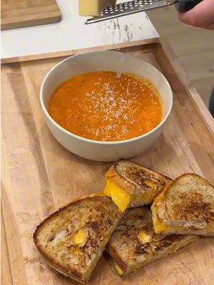 Tomato Basil Soup @jacquelinethoma ⬇️RECIPE⬇️ Roasted Tomato Basil Soup: 6 larger vine tomatoes, quartered 2 cups grape tomatoes 1 large red onion, quartered  1 red bell pepper, chunked  2 bulbs garlic  2 tbsp olive oil 2 tbsp tomato paste 1 tsp oregano 1 tsp thyme 3 tbsp fresh basil (more or less depending on desired potency) 1 cup vegetable broth  1 cup heavy cream 1 tbsp sugar 1/4 cup parmesan cheese salt to taste pepper to taste On a baking sheet, add tomatoes, onion, red pepper and bulbs of garlic. Drizzle with olive oil, salt, pepper, oregano and thyme. Roast at 400F for 35-40 minutes. Remove from oven and place in blender (don’t forget all the juices on the baking sheet). Squeeze garlic out of bulbs. Add basil and blend to your desired consistency. Pour into a large pot on medium heat. Add vegetable broth, heavy cream, tomato paste, sugar, parmesan cheese. Stir and reduce to simmer once bubbling. Simmer for 15 minutes. Serve. #cooking #dinner #Recipe #DinnerIdeas #husbandandwife 