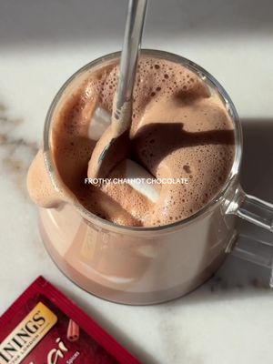 The warmest pick-me-up 🤎 #ad For when you need a sweet treat and a bit more caffeine to keep your day moving! Made with the flavorful and perfectly spiced chai from @Twinings USA 🫖 Recipe below! How to: Add 1 cup of whole milk to a pot. Add two chai tea bags and secure with the lid. Bring to a boil over medium heat. Reduce heat to simmer for 10 minutes being careful not to cook on too high of a heat. Remove from heat and add to a mug. Add 1 tbsp cacao powder and 1 tbsp granulated sugar. Using an electric whisk, whisk until fully combined and deliciously frothy. Top with marshmallows and enjoy! #twiningsusapartner #chai #tea #hotchocolate #recipes #fallvibes #fallrecipes #chairecipes 