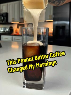 “You’ve never had coffee like this before…” I know you’re tired of your same old coffee recipe, so try this one with just a few home ingredients: Recipe: 1 tbsp Honey 3 tbsp Peanut Butter (melt it down for easier mix) 3 tbsp Heavy Whipping Cream 2 tbsp Milk → Whip it together with a froth tool In a cup: Ice Cold Brew  Add that creamy peanut butter topping Finish with a sprinkle of cocoa powder and mix Keep your coffee game exciting and fresh — hit follow for more recipes like this.  #CoffeeTok #IcedCoffeeRecipe #PeanutButterCoffee #HomeCafe #EasyCoffeeRecipe   