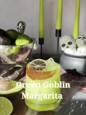 Green Goblin Margarita  1/4 avocado  .75 oz fresh lime juice  .5 oz agave  .75 oz melon liqueur  2 oz tequila  Chamoy and chili powder for rim  Dehydrated lime wheel for garnish  In a cocktail shaker, combine avocado, lime juice, and agave and muddle. Add in melon liqueur and tequila, fill with ice, and shake until cold. Rim a cocktail glass with chamoy and sprinkle with chili powder. Strain into the prepared glass and garnish. 