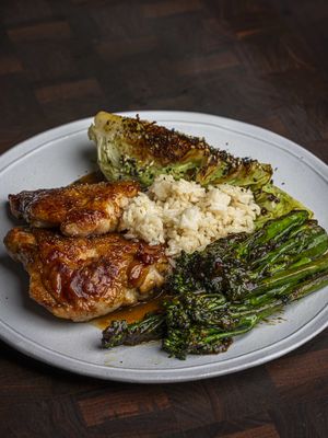 Chicken Thighs with Oyster Pan Sauce, Miso Cabbage & Garlic–Ginger Broccoli 🍗🥬🥦 Serves 2 Chicken 4 skin-on thighs • 3 tbsp oyster sauce • salt 1️⃣ Season skin generously. Start in a cold dry stainless pan on medium-low. 2️⃣ As the skin browns (Maillard reaction), it’ll release naturally. 3️⃣ When golden, brush with oyster sauce and roast 5 min @ 180°C (core > 75°C). Rest under foil or keep warm in oven with the door ajar (~40°C). Pan Sauce Shallot • garlic • ginger • 80ml dry vermouth • 1 tsp light soy • ½ tsp fish sauce • 1 tsp rice vinegar • 1 tsp mirin • 200ml chicken stock • 2 tsp lime juice • 3 tbsp cold butter 1️⃣ Sauté shallot till translucent, then add garlic & ginger. 2️⃣ Deglaze with vermouth; reduce till jammy. 3️⃣ Add sauces, vinegar, mirin; cook 1 min. 4️⃣ Add stock, reduce till it traces with a spatula. 5️⃣ Off heat: add lime juice & cold butter, swirl to emulsify. Miso Crème Fraîche Cabbage 1 sweetheart cabbage (quartered) • splash mirin & rice vinegar • 100g crème fraîche • 2 tbsp white miso • 1 tsp sesame oil • ginger • lime juice • herbs • salt 1️⃣ Char cabbage on grill/pan. 2️⃣ Braise ¾ submerged with mirin & vinegar till tender. 3️⃣ Blend remaining ingredients to a herby miso crème. 4️⃣ Spoon between leaves & sprinkle furikake. Garlic–Ginger Broccoli 125g tenderstem • avocado oil • chilli oil • garlic • ginger • 1 tbsp soy • 1 tsp dark soy • 1 tsp mirin • 1 tsp sesame oil • 1 tsp starch • 2 tbsp water 1️⃣ Mix sauce. 2️⃣ Sear broccoli for colour; remove. 3️⃣ Add chilli oil, garlic & ginger; cook gently 3 min. 4️⃣ Return broccoli, pour sauce, cover to steam ~1 min.