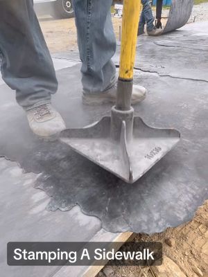 We just stamped a concrete sidewalk so that it looks like a continuous piece of slate #build #howto #construction #DIY #contractor 