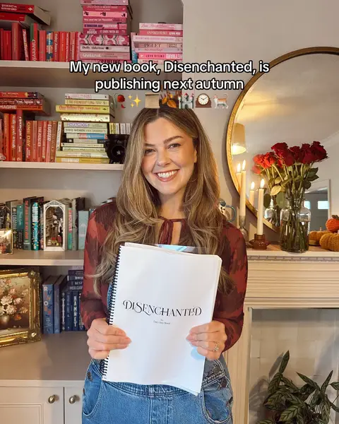 Well, consider me spellbound ✨ While I’m still trying to process the fact that I’ve written and published one book, let alone two, here comes a THIRD AND A FOURTH 🥲 Absolutely soooo, so normal and totally believable!!  📖 Disenchanted is coming to bookshelves next September. We’re returning to the cosy world of Rewitched and Uncharmed, but this time think light academia Hocus Pocus x Beauty and The Beast, with a sprinkle of Shrek…?  Disenchanted is the story of Sage Hemlock, who has turned her back on magic long ago. Magic has betrayed her before, bringing nothing but heartache, and she will not let something so foolish happen again. 🔎 Instead, Sage has thrown herself into her work, running the local museum and largely preferring the company of her archives to other humans. With her self-proclaimed tendency of ruining things, all she has to do is make it to Halloween without the coven discovering her, so that she can finally banish her blasted powers forever. 🍂 But when a strange, historical artefact turns up at the museum and accidentally triggers a spell, Sage’s small-town life is suddenly overrun. It seems there’s a beanstalk growing in her garden, and her friend Casimir starts to look worryingly like a handsome prince… Fairytales are coming true. Now, with the threat of the coven on her tail, Sage must confront the magic she’s always denied, to save everyone she’s come to love from being lost to a fairy tale forever.  🥀 Disenchanted is full of comfort and nostalgia, but also just a ton of whimsy and joy, because the past couple of years have shown me how important it is to prioritise softness and magic even when it feels difficult. I would be so, so grateful if you’d like to pre-order this one at the link in my bio, and I can’t wait for you to meet totally-just-friends Sage and Casimir (and her cat Mal, because of COURSE there’s a cat) ❤️🥀📜☕️🍂🏰🕰️🐱✨ And yep, there’s also a fourth book on the way too but let’s do this one first 🫠 #rewitched #uncharmed #booktokfyp #cozyfantasy #bookish @Pan Macmillan UK 