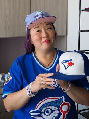 Lesley Mak, a Jays superfan and fitted hat aficionado, breaks down the lore behind the team's beloved white-panelled caps. #bluejays #jays #torontobluejays #jayshighlights #MLB #WorldSeries #letsgobluejays  Video by Christian Malong