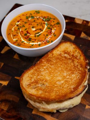 Butternut Squash Soup and Grilled Cheese Nothing says comfort like a good soup and grilled cheese. The crispy bite of buttery sourdough dipped into warm soup is one of the best things you can eat, especially this time of year. Find the full recipe on my website, link in bio. Butternut squash soup recipe Grilled cheese and soup Cozy fall dinner ideas Easy recipes Creamy butternut squash soup fall soup recipes
