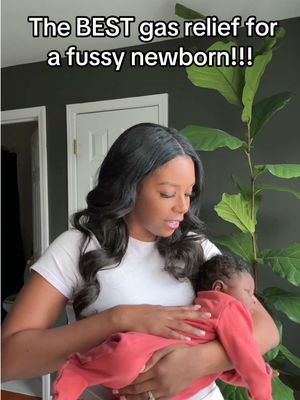 Trust me when I say this position helps relieve gas! The football hold is perfect for babies #newbornbabies #newborntips #footballhold #newborngasrelief #momhacks #postpartumlife #newborntrenches #momtips #momadvice 