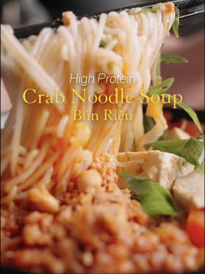 Full Recipe & Macros Below 👇 Bún Riêu (Vietnamese Crab & Tomato Noodle Soup) 🍜🇻🇳 (6 Servings) Per Serving: ~480 kcal | 42g P | 22g C | 22g F (without noodles) Ingredients • 345g Extra Lean Ground Beef (0.76 lb) • 225g Crab Meat • 100g Vietnamese Crab Paste • 15g Shrimp Paste • 15g Tamarind Paste • 500g Firm Tofu (cut into ½-inch cubes) • 85g Dried Shrimp (3 oz, soaked & rehydrated) • 5 cups Water (for shrimp stock) • 2 Eggs • 5 Garlic Cloves (minced) • ½ medium White Onion (diced) • 3 Tomatoes (cut into wedges) • 1 tbsp Fish Sauce • 3L Water • 900–1350g Pork Spare Ribs • 1.5 tsp Salt • 2 tbsp Stevia • 2–3 Scallions (chopped for garnish) • Vermicelli Noodles, Cilantro, and Lime Wedges (for serving) Directions 1. Bring 5 cups of water to a boil, add dried shrimp, and simmer for 20–30 minutes. 2. Remove shrimp, reserve the liquid, and grind the shrimp finely. 3. In a bowl, mix ground shrimp with beef, crab meat, crab paste, shrimp paste, and eggs. Set aside. 4. Heat ¼ cup oil in a pan, sauté garlic until fragrant, then add onion and cook until translucent. 5. Add tomatoes and sauté for 2–3 minutes until softened. Set aside. 6. In a large pot, combine 3L water with reserved shrimp liquid and bring to a boil. 7. Add pork ribs, reduce heat, and simmer for 30 minutes, skimming off any foam. 8. Add sautéed tomatoes, salt, stevia, fish sauce, tamarind paste, and shrimp paste; stir to combine. 9. Add tofu, then gently spoon in the crab mixture one scoop at a time. 10. Simmer until the crab mixture floats to the surface. 11. To serve, place vermicelli noodles in a bowl, ladle over broth, tofu, ribs, and crab mixture. 12. Garnish with scallions, cilantro, and a squeeze of lime. #asianfood #vietnamesefood #Recipe #highprotein #EasyRecipe 