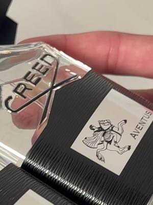 🚨 Fake Creed Aventus Alert!  Think you scored a deal online? Look closer. 👀 Real Creed Aventus bottles have crisp text, flawless glass, and perfect labels — but fakes often have blurry fonts, cheap glass, and crooked stickers. 🕵️‍♂️ #FakePerfume #CreedAventus #RealVsFake #FragranceTok #PerfumeTok      