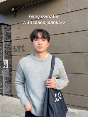 Grey sweater and black jeans combo 