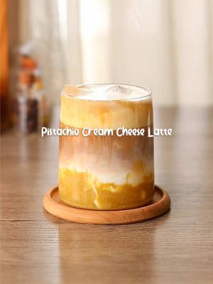 🥜☕️🧀 Pistachio Cream Cheese Latte 📝 Recipe Cream Cheese Foam 🧀: 30g • Cream Cheese 20g • Sweetened Condensed Milk 20g • Whipping Cream 20g • Milk ~mix using hand mixer / milk frother 1 tbsp • Pistachio Spread Pour a little of Cream Cheese Foam ~mix Ice Cubes 🧊 100g • Milk 1 Shot •Espresso Cream Cheese Foam on top — #homecafe #coffee #asmr #toogoodtobebad #oliviamarsh 
