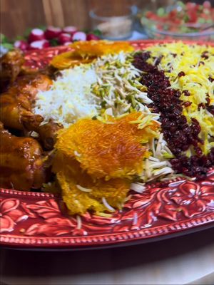 RECIPE Zereshkpolo Ba Morgh Kommentera om ni vill ha receptet på svenska Morgh(chicken): - About 1 kg chicken  - Yellow onion - Garlic cloves - 1 tablespoon turmeric - 1 tablespoon paprika - 1 tablespoon garlic powder - 1 g saffron (amount can be halved) - About 2 tablespoons tomato paste - Chicken stock - Salt & pepper - Olive oil and butter for frying Instructions: 1. Remove the skin from the chicken. Start grinding the saffron and pour it over a few ice cubes, allowing the ice to melt with the saffron. 2. Boil the chicken for a few minutes. Remove the chicken from the pot and drain the stock and keep it for later. 3. Sear the chicken for a few minutes on each side until it gets color. Remove the chicken from the pan. 4. Add the onion and garlic and tomato paste, sautéing until they turn a nice color along with the turmeric, paprika, and garlic powder. 5. Pour in the stock. Return the chicken to the sauce. Cover and let simmer for at least 30 minutes.  Comment if you want the recipe for the rice with Tahdig #zereshkpolo #persiantiktok #persianfood #persian #iran 