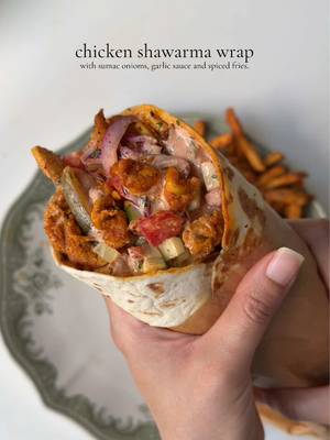 Chicken shawarma wrap 🌯 Ingredients  For the chicken: 2 lb boneless chicken breast/ thighs, cut into thin slices  1 tbsp fresh garlic, finely minced  2 tbsp mayonnaise  1 tbsp olive oil 1 tbsp smoked paprika powder  1 tsp garlic powder  1 tsp black pepper powder  1/2 tsp cumin powder  1/2 tsp coriander powder  1 tsp red chili powder  1/2 tsp turmeric powder  Salt to taste 1 tbsp fresh lemon juice  3 tbsp clarified butter/oil for cooking  For the sumac onions 1 large red onion, thinly sliced and washed  1 tbsp fresh parsley, chopped  1 tbsp sumac  1 tsp lemon juice  Salt to taste For the garlic sauce : 1/3 cup mayonnaise  1/3 cup sour cream 3-4 tbsp butter milk ( less or more to adjust the consistency of the sauce ) 2 tbsp ketchup  2 tbsp hot sauce  1 tsp freshly chopped parsley  1 tsp lemon juice  1 tbsp garlic powder  1 tbsp smoked paprika powder  Salt to taste 1/2 tsp black pepper  To assemble: 6 tortilla wraps 1/2 cup cucumber, chopped  1/2 cup tomatoes, chopped  Spiced French fries 1/2 cup pickled cucumbers  Method: In a mixing bowl add chicken, season with salt, pepper, garlic powder, smoked paprika powder, turmeric, red chili powder. Add in the mayonnaise, garlic, oil and lemon juice. Mix until well combined. Cover and let it marinate for at-least 1 hour. Prepare the sauce by mixing mayonnaise, sour cream, buttermilk, salt pepper, paprika powder, garlic powder, hot sauce, lemon juice, ketchup in a bowl. Whisk until smooth and creamy.  Make the sumac onions by mixing onions, parsley , sumac, salt lemon juice in bowl. In a pan, heat clarified butter over medium heat. Once melted, add the chicken and cook in batches, ensuring not to overcrowd the pan. Cook for about 8-10 minutes, tossing occasionally, until the chicken is fully cooked through. Assemble the wrap by warming the tortilla, then adding sauce, Sumac onions, chicken, tomatoes, cucumber, pickled cucumbers, French fries, and more sauce. Close it and serve one. #chickenwrap #Recipe #shawarma 