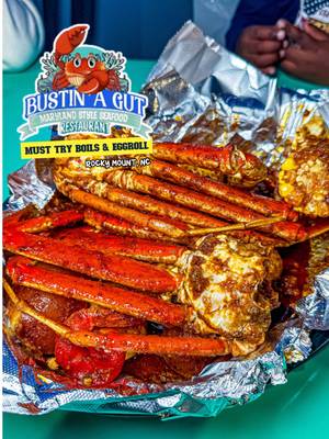 🚨WARNING: Rocky Mount, NC Is Gatekeeping This Seafood Spot! 🚨 People of Rocky Mount, NC, why didn't you tell us about this spot?! We tracked down Bustin’ A Gut Seafood and nearly went back twice in the same week. All jokes aside, the food is so good it will have you seriously checking Zillow for properties closer to their kitchen. They've earned that solid 4.4 Google rating—go get some before they start charging admission! PROTIPS: 💰 Two pieces of fish and two sides for $12.99 👍🏽 Prepare to wait, and be patient 😱 Been in the industry for over 50 YEARS!  ‼️ The SEAFOOD EGGROLL is a PROBLEM! SO GOOD!    🤯 They season everything, even the lemons on the plate!    ••••••••••••••• 📍 BUSTIN A GUT ⭐️ 5 out of 5        135 SE Main St, Rocky Mount, NC 27801 ••••••••••••••• #nccheck #nctiktok #northcarolina #explorepage #fyp 