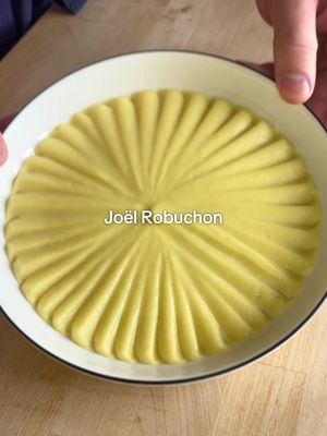 How to Make Joël Robuchon’s Mashed Potatoes 🥔🇫🇷 🥔🇫🇷 FULL RECIPE BELOW ⬇️ INGREDIENTS:  1.25kg ratte potato (or Yukon gold) (your yield should be 1kg after peeling) 250mL whole milk ** 250g unsalted butter, diced  4-5 sprigs thyme 1 tsp black peppercorns 2 cloves garlic, gently smashed Fine sea salt, to taste ** all of this milk likely won’t be needed. Some can be kept aside to re-heat the potatoes later. INSTRUCTIONS: 1. In a large, heavy bottom pot, ideally large enough to fit all your potatoes in a single layer, cover your potatoes with cold water. Bring to a boil over high heat, then lower your heat to medium. Allow your potatoes to cook for 20-30 minutes, or until you can pierce your potatoes with a pairing knife with zero resistance.  2. While your potatoes are cooking, bring your milk to a boil with your thyme, garlic and black peppercorns. As soon as it comes to a boil, turn off the heat and allow the aromatics to steep while the milk stays hot. 3. When your potatoes are done cooking, strain them, and let them sit in the strainer for 5-10 minutes to allow steam to be released. Once they are cool enough to touch, but still hot, peel the potatoes & discard the skins. 4. Press your potatoes through a potato ricer into a large bowl. Strain the aromatics out of your milk, and pour half of the milk into the riced potatoes. Fold the milk gently into the potatoes until incorporated. Then, pass your potatoes once more through a fine mesh strainer into a large pot (this step is optional, but does result in THE smoothest potatoes). 5. Put the pot over low heat, and add a couple tsp more milk as needed until your potatoes are smooth. At this point, you can decide how smooth/luxurious you would like your potatoes. If you want them to be more of a "purée", add all of the butter and extra milk for the true Joel Robuchon Ratio. If you want more of a traditional mashed potato consistency, don’t add any milk, and only add half the butter. Regardless of what you choose, at this point you can season your potatoes with salt to taste. Serve your potatoes as a side with any roast or braised meat, and enjoy!  #mashed #potatoes #michelin #homecooking #Recipe 