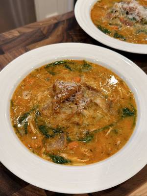 Chicken Orzo Soup  The perfect soup to warm you up this winter. It’s a new take on an old classic, chicken noodle soup. I used Calabrian chili in the broth for an extra kick and baked the chicken skin for an added crunch. The orzo gives it a lighter feel and the heavy cream brings richness without being overly creamy.  Recipe: Chicken: 1 1/2 pounds chicken thighs Salt and pepper  Avocado oil -Generously season chicken on both sides with salt and pepper. -In a cold medium pot, add avocado oil and place chicken skin side down. Turn heat to medium-high and cook for 8-10 minutes. Flip and cook for another 5 minutes. Remove chicken from the pot and remove the skin. Place skin on a baking sheet lined with parchment paper and cook in the oven for 8-10 minutes at 350°F. Set aside. Soup: 3 tablespoons avocado oil 2 medium carrots, diced 2 celery stalks, diced 1 medium leek, diced 1 medium yellow onion, chopped 3 garlic cloves, minced 8 cups chicken broth 1 tablespoon Calabrian chili  2 tablespoons tomato paste  1 teaspoon oregano 1 teaspoon dried dill 2 bay leaves  5 sprigs of thyme 3/4 cup orzo 1/4 cup heavy cream 3 cups baby spinach, packed Salt and pepper to taste Grated Parmesan cheese, for topping -In the same pot over medium-high heat, add carrots, celery, leek, and onion. Season with salt (1 teaspoon at a time) and pepper and sauté until vegetables are tender, about 10 minutes. -Add tomato paste, Calabrian chili, garlic, oregano, and dill. Cook, mixing for 3 minutes. Add the chicken broth, mix, and season with salt and pepper.  -Add the chicken back in with bay leaves and thyme. Bring to a simmer, cover, and cook for 10 minutes. Remove the chicken, shred it, and add it back to the pot.   -Add orzo and cook for 12 minutes, until orzo is fully cooked. Add heavy cream and mix to combine. Add spinach and mix until just wilted. Season to taste with salt and pepper. Serve with crispy chicken skin and Parmesan cheese. Enjoy! #food #soup #chicken #dance #EasyRecipe 