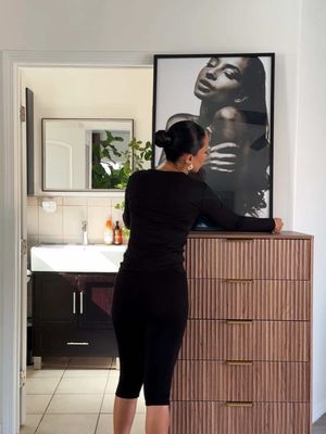 it was time to change up this corner but can't seem to let go of my sade poster. what do you think: stay or swap?