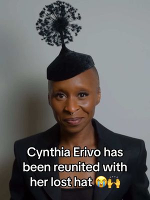 At the London premiere of Wicked on November 18, 2024, Cynthia Erivo arrived in a dramatic black Schiaparelli gown paired with a sculptural black hat that turned heads. After the event concluded, the hat didn’t make it home with her, it was left behind at the venue. Enter a fan named Clara, who attended the premiere with a friend and noticed the hat about 30 minutes after the screening. She took it home so it wouldn’t be thrown out by theater staff, though at that moment, she didn’t realize whose hat it was. Over the next year, Clara held onto the hat, unsure how to return it. Finally, on November 8, 2025, she ran into Erivo and revealed she had the missing hat. Erivo’s reaction? Priceless: “For real? You have the hat? Oh my God!” she asked. “May I have it back, please? I thought I had lost it forever,” Erivo said. Her team quickly moved to collect contact information from Clara so the handoff could happen. Erivo later posted on Instagram a video of herself re‑wearing the long‑lost hat, set to the song “Dancing Through Life,” and captioned it: “We deserve each other.” A perfect little fashion story, coming full circle. 💚 🎥: @Cynthia Erivo IG