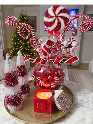 Candy Cane Christmas DIY Centerpiece. This holiday let’s make it fun, festive, and full of charm with this beautiful arrangement. The easiest way to bring that sweet Christmas magic right into your home. To SHOP  Direct URL ➡️ https://www.shopltk.com/explore/Styledby_ness/posts/ea8a54bf-c19c-11f0-b58a-0242ac110026 #christmas #christmasdecor #candycanedecor #christmasdiy #diydecoration