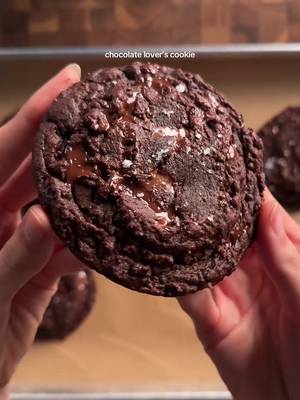 chocolate lovers cookie 1 cup (226g) unsalted butter, softened 3/4 cup (150g) light brown sugar 1/2 cup (100g) white sugar 1 egg 2 tsp (8g) vanilla 2 1/4 cup (270g) ap flour 1/2 cup (50g) dutch-process cocoa powder 1/2 tsp (3g) baking soda 1/2 tsp (3g) salt 1/4 tsp (1g) espresso powder 1 1/2 cups total chocolate (i used dark, semi, milk) *cream together the butter and sugars, then add in egg and vanilla. in another bowl, whisk the flour, cocoa powder, baking soda, salt, espresso powder (optional). add the dry to the wet and fold gently to combine without overmixing! add in your chocolate of choice. set in the fridge at least an hour then bake at 350 for 12-14 min (time with vary with the sizes). top with flakey salt and enjoy! #chocolate #cookie #Recipe #baking 