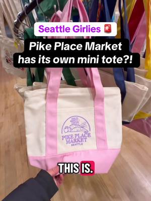 Uhm this is for the Seattle Girlies who love the Trader Joe’s Tote Bag 👀 My friend @jenny_doingstuff and I were walking through Pike Place Market and we stopped by Pike Place Bags. I LOVE that they have a Pike Place Market colorful mini tote. I’m such a sucker for a cute tote bag. I ended up buying the green mini Pike Place Market Tote Bag and my friend Jenny bought the big version. Both tote bags have zippers!  Would you use a mini tote bag like this? Share this with a Seattle girly or a PNW friend who would love a mini Pike Place Market tote bag!  #seattletiktok #pikeplacemarket #seattlewashington #totebags #totebagaesthetic 
