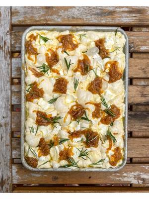 Very Thanksgiving. Very centerpiece-energy. Very fall. This focaccia is the moment. Soft, golden, well oiled in @Graza Drizzle, topped with goat cheese + brie + caramelized onions + rosemary + cranberry-sumac sauce. It’s that dish that goes on the table and suddenly the room gets quiet for a second. Like… “Wait, who made this?” -You did. And you’re the hero now. Full recipe on my website BenGingi.com YASSS! #GrazaPartner 