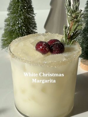 I’m dreaming of a white Christmas…margarita. 🎄 -1.5 oz. tequila -1 oz. coconut milk -1 oz. coconut water -1/2 oz. triple sec or orange liqueur -1/2 oz. lime juice -sugared rosemary & cranberries #christmas #whitechristmas #margarita #christmascocktails #holidays
