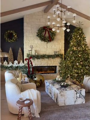Lush garland, warm brass accents, a softly lit tree, and the sweetest Winter Chalet House collection 🎄@lisa.kanegae’s living room is wrapped in holiday cheer. Tap our link in bio to recreate the look. #mypotterybarn