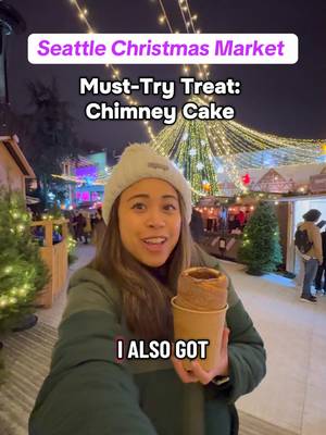 The chimney cake at Seattle Christmas Market 😋 one of my favorite treats I’ve had at the Seattle Christmas Market so far!  A chimney cake is a popular festive treat at a Christmas Markets around the world. I’ve seen chimney cakes at both Prague and Munich Christmas markets. And I love that you can find chimney cakes in Seattle!  Share this with a friend who would love to try a chimney cake at the Seattle Christmas Market! #seattlechristmasmarket #seattle #seattletiktok #christmasmarket #pnwadventures 