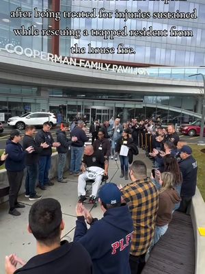officer is released from the hospital after being treated for injuries sustained while rescuing a trapped resident from the house fire to a strong showing of support from  Police Department, Fire Department,& First Aid Squad.