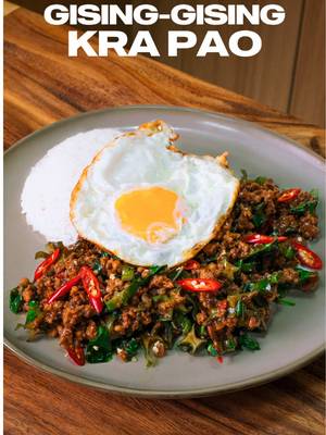 Gising-Gising Kra Pao 🇹🇭🔥 Gising-Gising is already known for that super crunchy texture, thanks to the sigarilyas (winged beans), easily one of the most underrated veggies out there. And when you look closely, Gising-Gising and Pad Kra Pao actually share a lot: ground pork, chilies, aromatics, and even beans. The key differences? Gising-Gising brings the creaminess from coconut milk and the savory depth of bagoong, while Pad Kra Pao hits you with that salty-sweet sauce and the aroma of Thai basil. So I combined the two — wingbean crunch, Kra Pao sauce, a touch of coconut milk, and Thai basil to finish. The result is creamy, spicy, aromatic, and incredibly crunchy… a Filipino–Thai fusion that hits all the right notes over a bowl of hot rice. Share with someone who would love this ❤️